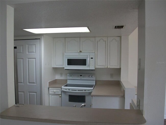 Building Photo - 511 Coconut Palm Way