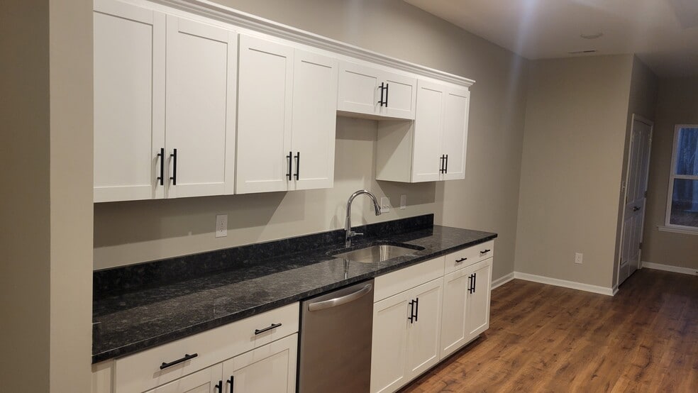 left side kitchen cabinets and eating area nook - 1908 Charles Raper Jonas Hwy