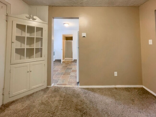 Building Photo - PRELEASING for AUGUST! Walk to Ball State! Bright 4BR Home with Fireplace