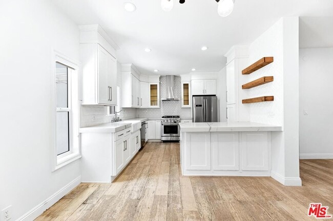 Building Photo - 7614 Willoughby Ave