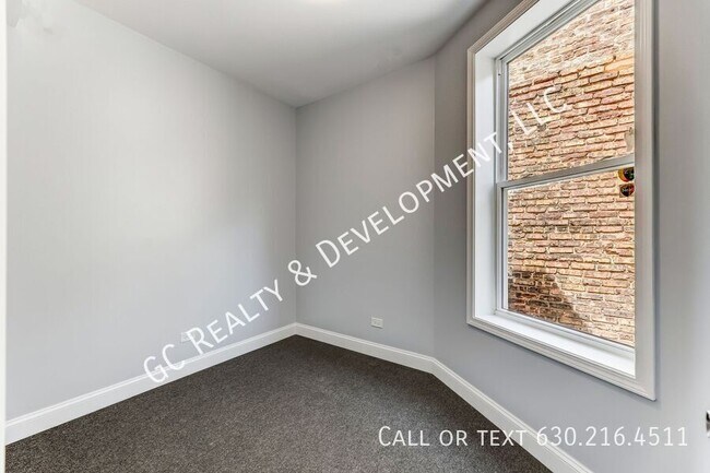 Building Photo - 6433 S Vernon Ave