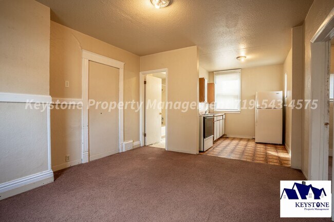 Building Photo - Ground Level, One Bedroom Apartment with A...