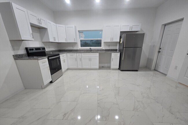 Building Photo - BRAND NEW THREE BEDROOM, 2 BATH, 1 CAR GAR...