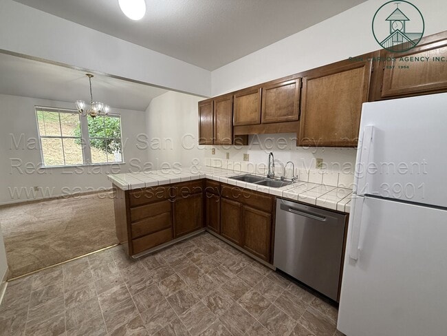 Building Photo - Refreshed Two Bedroom Pacific Grove Townhome in Gated Community