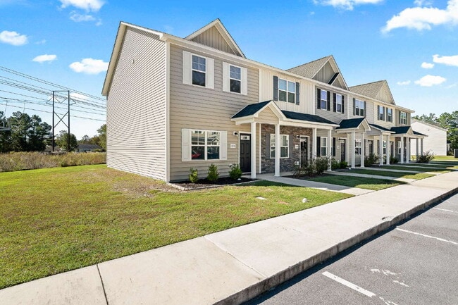 Building Photo - Charming 2-Bedroom, 2.5 Baths Townhouse in...