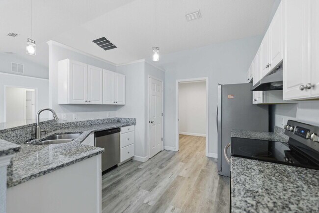 Building Photo - 3BR Summerfield Rental | Granite Kitchen | Covered Porch | $1,800 | Available Now