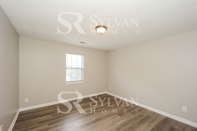 Building Photo - Lease today! No extra charge for contentme...