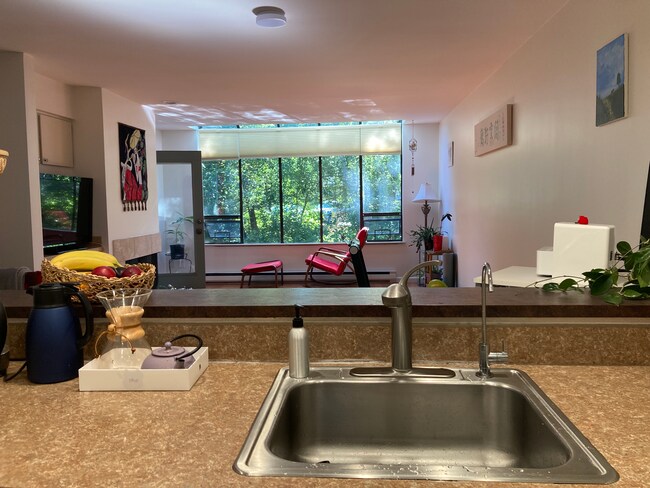 Looking into the living room from the kitchen. - 6 Lake Bellevue Dr