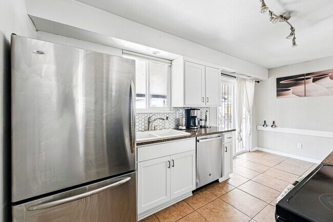 Building Photo - Updated 4-Bedroom Home with Large Backyard...