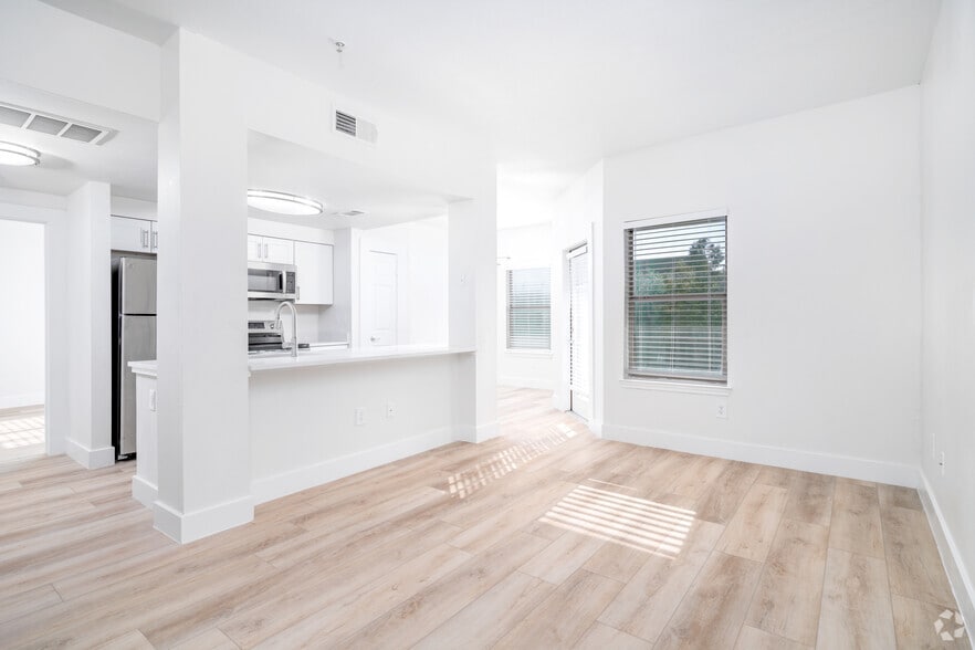 1BR, 1BA - 734SF - Living Room - The Villages at Lost Creek