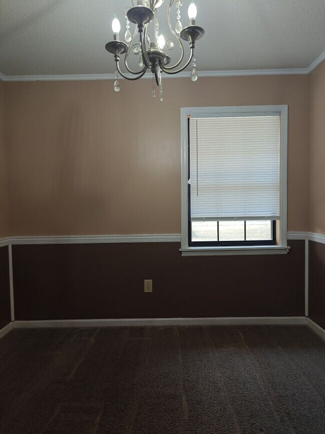 Building Photo - Elegant & Spacious 3-Bedroom Brick Home with Private Garage