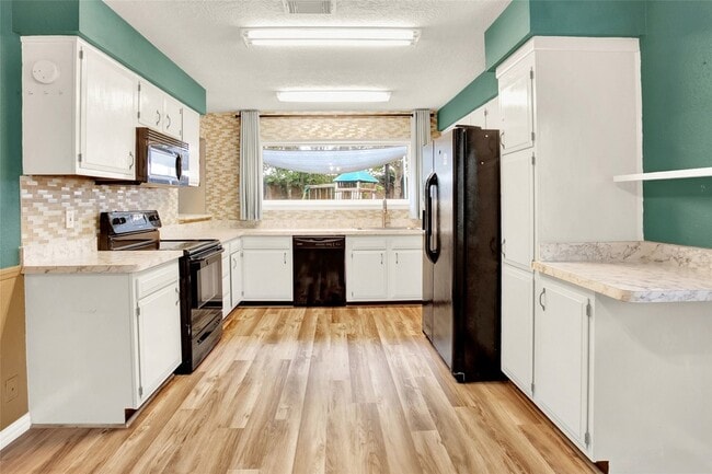 Building Photo - 6219 Silver Leaf Dr