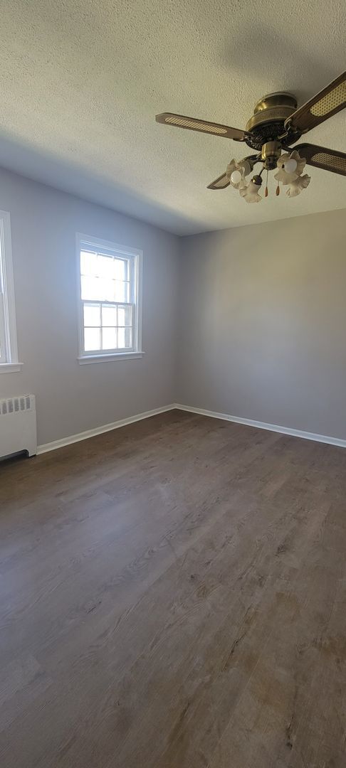 Building Photo - "Chic 1-Bedroom Condo: Your Ideal Home in ...