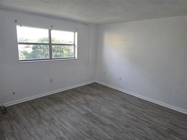 Building Photo - 8225 Sunrise Lakes Blvd