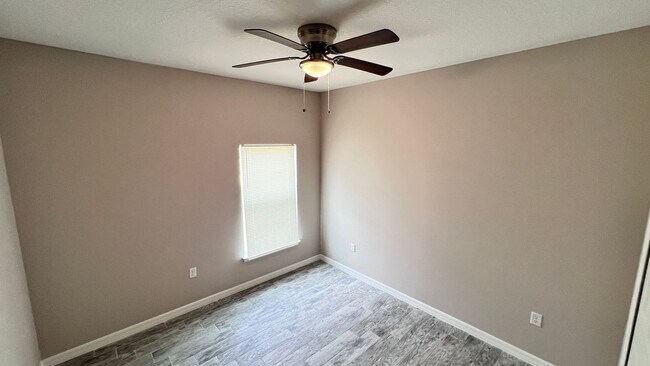 Building Photo - Spacious 3-Bedroom Home with Garage & Pati...