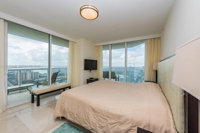 Building Photo - 16699 Collins Ave