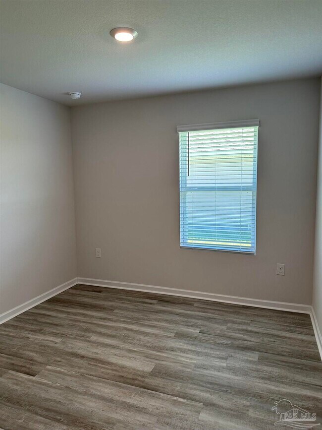 Building Photo - 6497 Firefly Dr