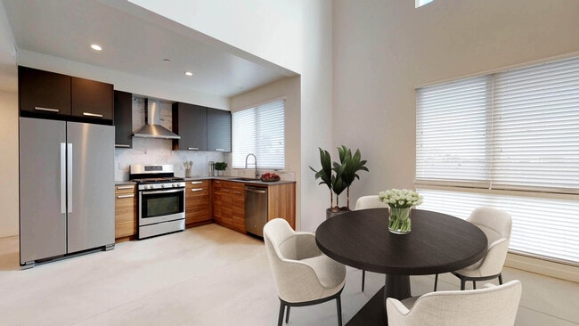Building Photo - The Evelyn Townhomes: Luxe Living in the H...