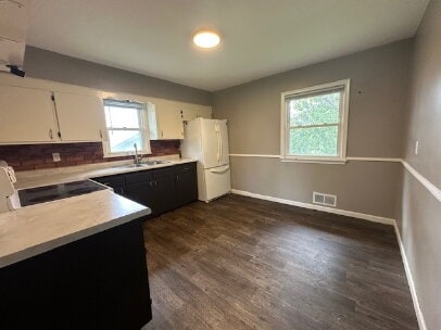 Building Photo - "Charming 2-Bed Hideaway in NE Minneapolis - Spacious 900 Sq. Ft. Comfort!"
