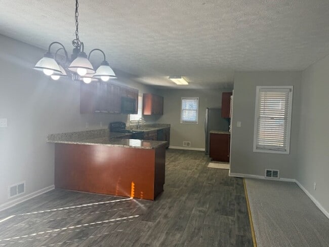 Building Photo - Beautifully Updated 5BR / 3.5 Bath Brick Ranch with Finished Basement!