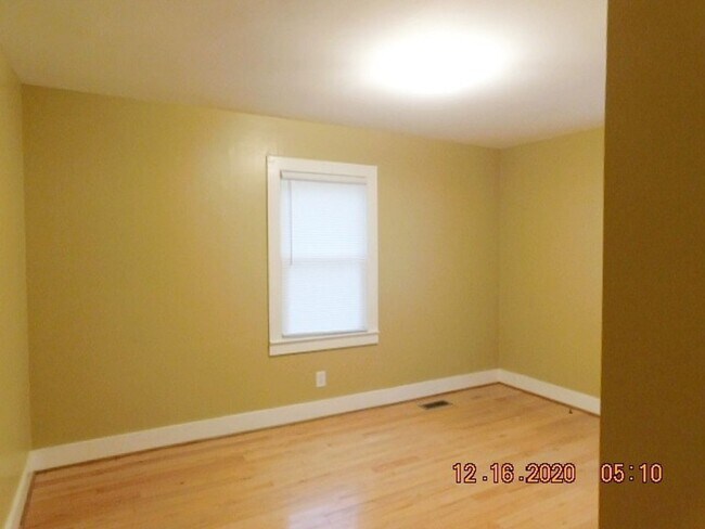 Building Photo - Home with 2 bedrooms, 1 bath, side deck, carport with side porch and detached garage