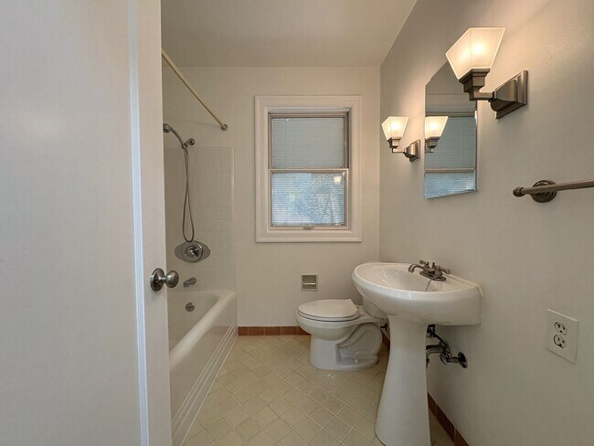 Building Photo - Charming Updated 4BR Home on Prime Corner ...