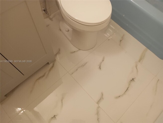 Building Photo - 5861 NE 18th Ave