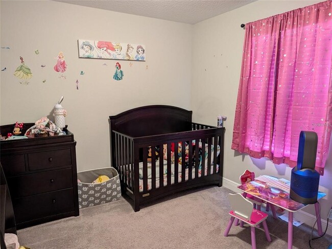 Building Photo - 7545 Pool Compass Loop