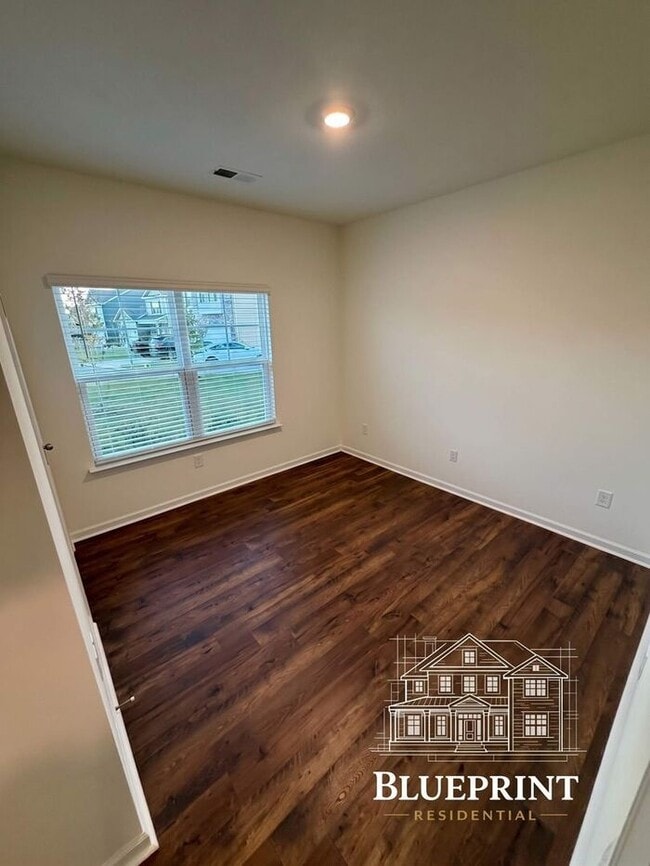 Building Photo - Single story living 2025 build with custom layout and many upgrades! Private backyard! Available ...