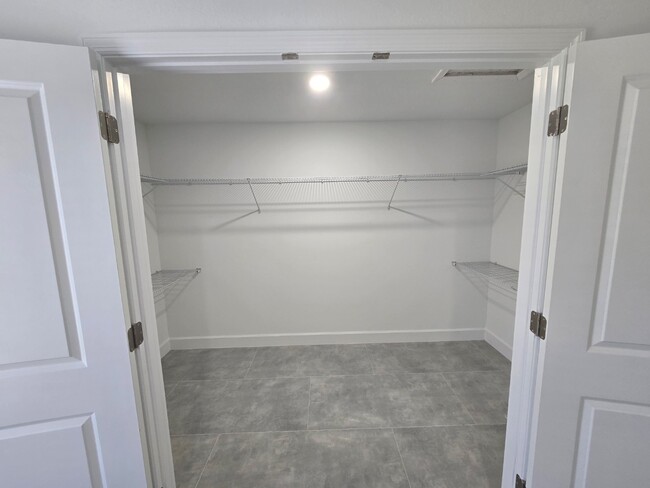 Building Photo - Brand-New 4-Bed Beauty with Attached Garage in Palm Bay – Modern Comfort, Prime Convenience!