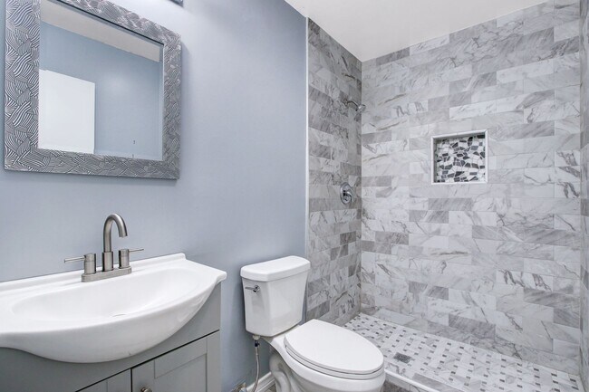 Building Photo - ***APPLICATION CURRENTLY UNDER REVIEW***Contemporary Single-Level Home with 3 Bedrooms, 2 Bathroo...
