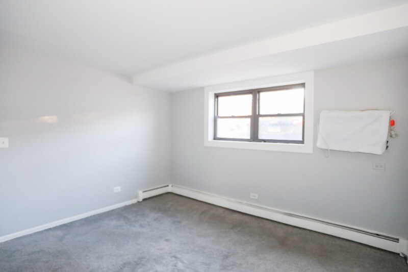 Building Photo - 9016 Lamon Ave