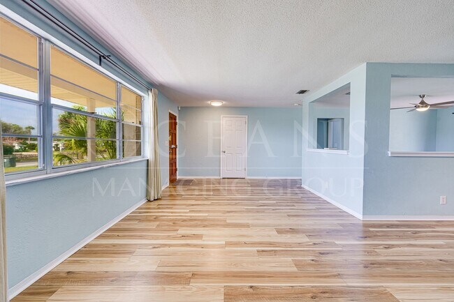 Building Photo - Welcome to your Perfect Beachside Retreat!