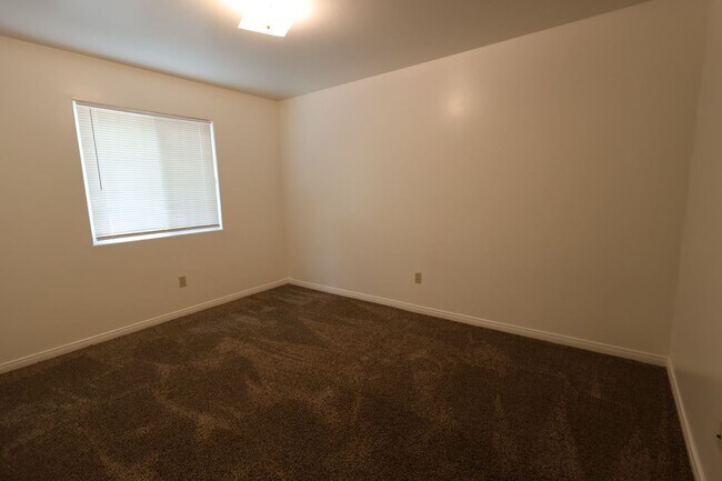 Building Photo - Spacious 3 Bedroom Duplex with Private Patio –Available! Ask About Our Move-In Special!