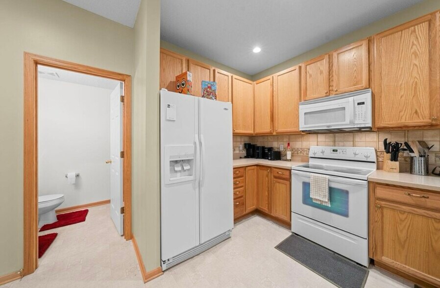 Kitchen and half bathroom - 9616 Linden Ln N
