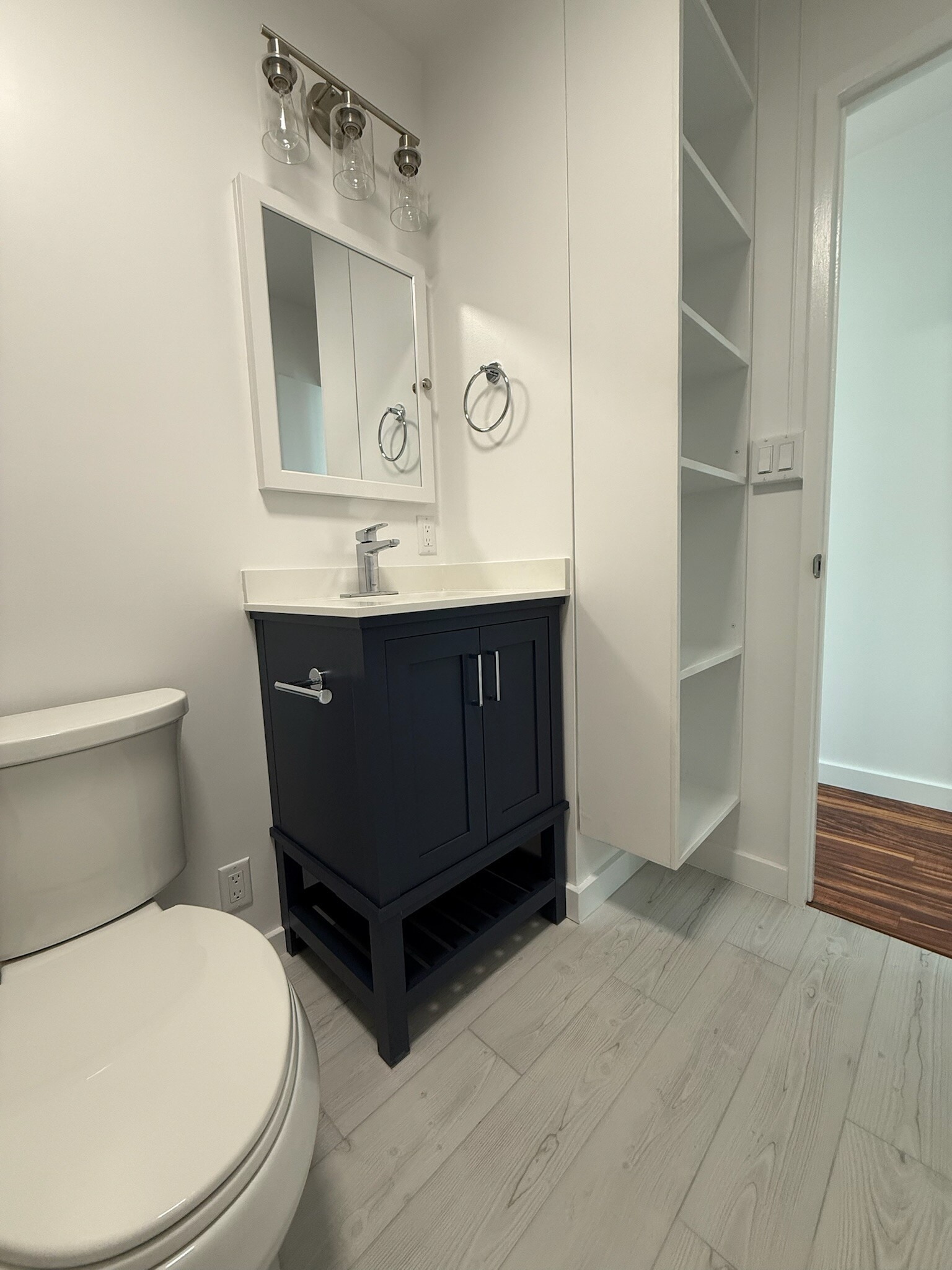 Bathroom / vanity and storage shelf - 241 Hualani St