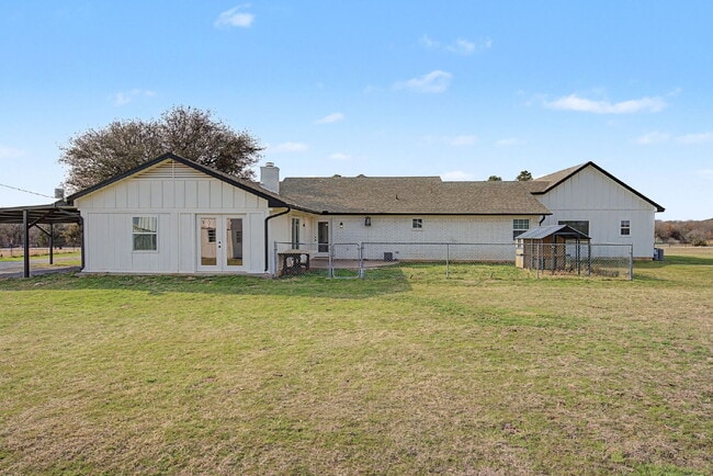 Building Photo - “4-Bedroom, 3-Bath Farmhouse Charm Meets Modern Luxury on a Serene 5-Acre Lot!”