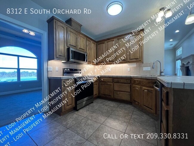 Building Photo - 8312 E Orchard Rd