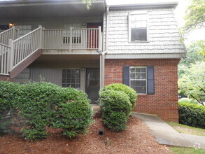 Building Photo - MAIN LEVEL END UNIT OVERLOOKING POOL!