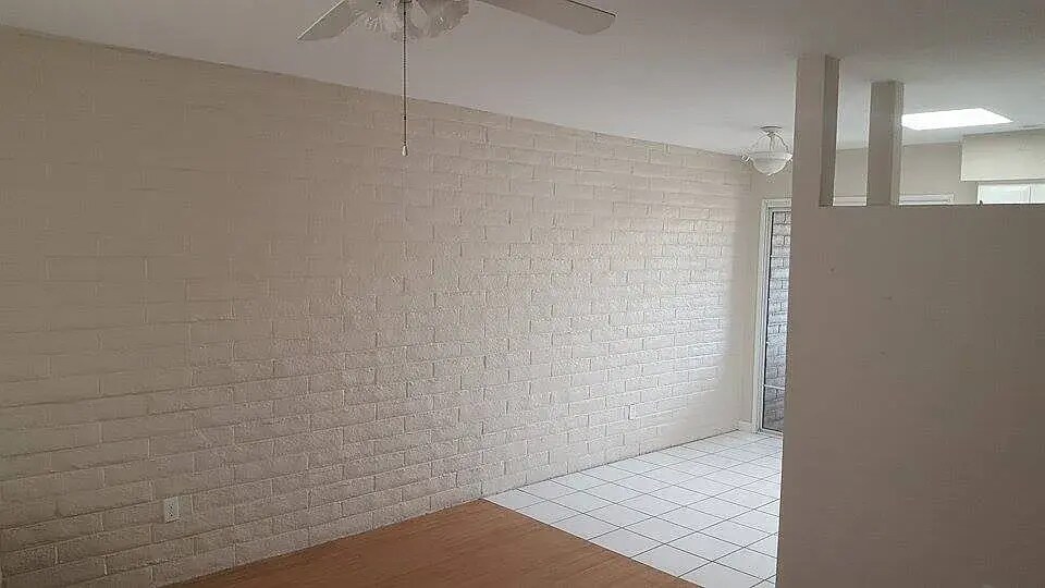 Dining/LR brick wall - 3646 E Blacklidge Dr
