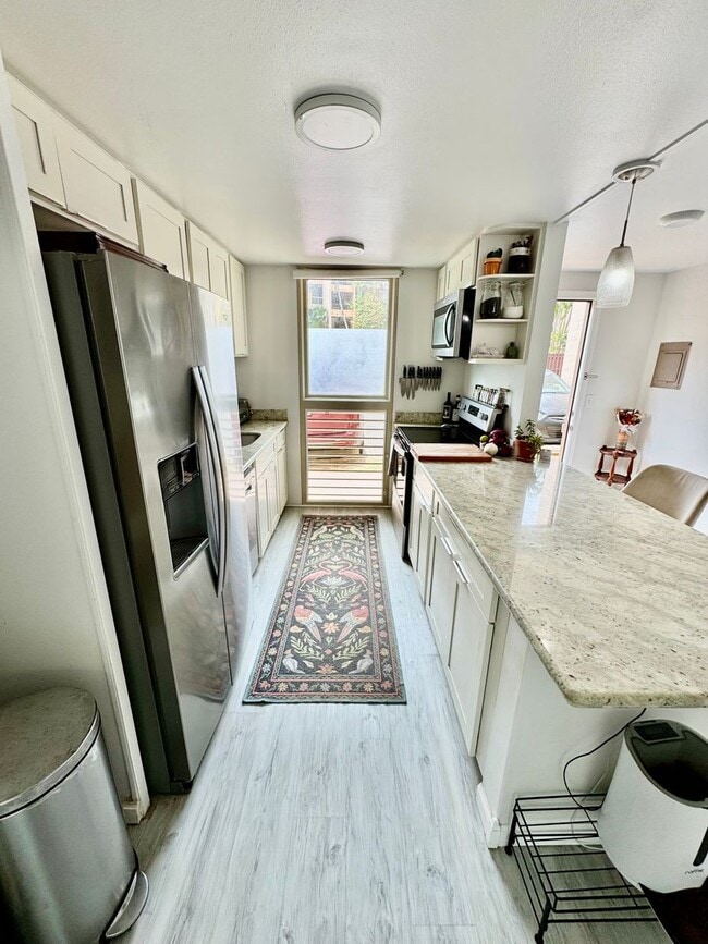 Building Photo - TAvailable Now | Partially  Furnished 1 Be...