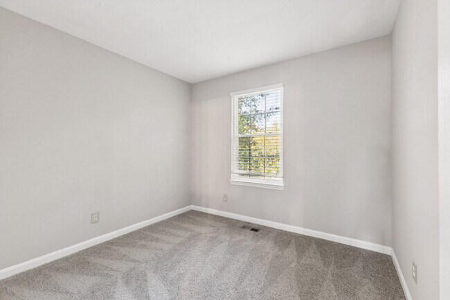 Building Photo - Welcome to this bright and beautifully mai...