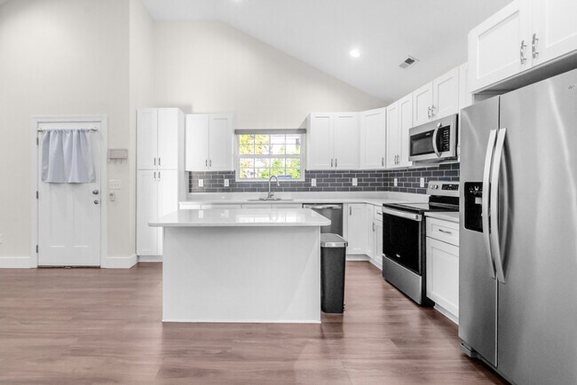 Building Photo - LIVE CLOSE TO THE ACTION — Modern 3-Bedroom Rental in Charlotte’s Reid Park!