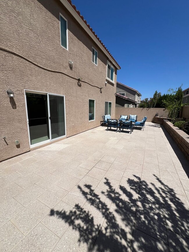 Building Photo - A Fantastic 4 Bedroom Home with the primary Downstairs, in Silverado Ranch