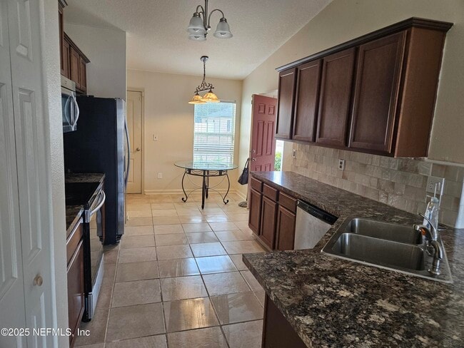 Building Photo - 15379 Bareback Dr