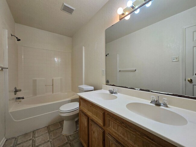 Building Photo - RENT REDUCTION - AVAILABLE NOW!