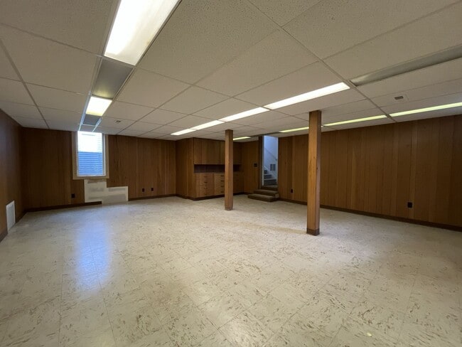 Building Photo - Expansive 4BR 2,900+ Sq Ft Home with Theater-Style Living Room & Bonus Hobby Workshop