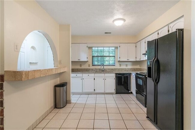 Building Photo - 5000 Village Green Way