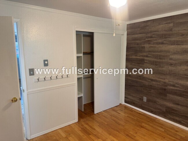 Building Photo - Spacious 4-Bedroom Upper-Level Home with Fireplace, Bonus Room & Large Deck