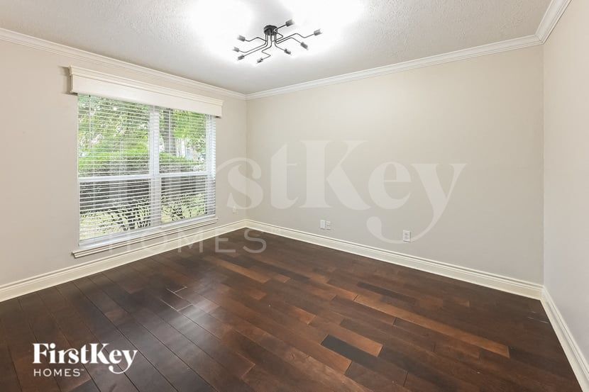 Building Photo - 6722 Woodland Oaks